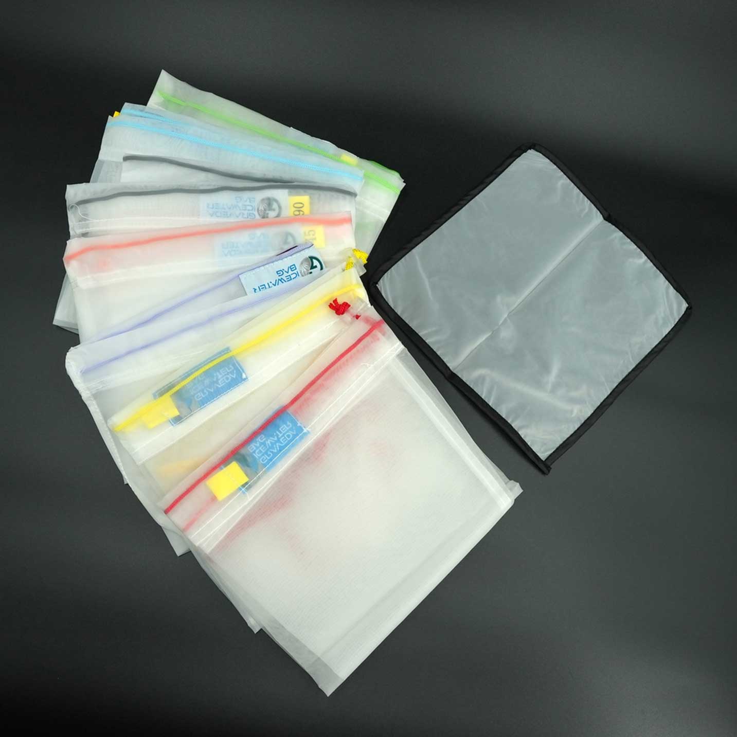Graveda Bubble & Filterbag Set komplett – alle sieben Filterbeutel plus Pressing Screen nebeneinander ausgelegt, geeignet für die Ice-Water-Extraktion von Bubble H@SH
